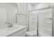 This bathroom features a single sink vanity and a glass enclosed shower at 809 Hyperion Aly, Wake Forest, NC 27587
