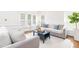 Comfortable living room with lots of natural light, plush furniture, and stylish decor at 8913 Walking Stick Trl, Raleigh, NC 27615