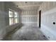 Unfinished bedroom featuring two windows offering great light and potential for customization at 1027 Coldspring Circle, Durham, NC 27705
