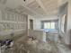 Large unfinished living room with great natural light ready for your personal touch and design at 1027 Coldspring Circle, Durham, NC 27705