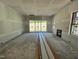 Unfinished living room with sliding glass doors, fireplace and electrical outlets ready to be customized at 1027 Coldspring Circle, Durham, NC 27705