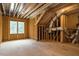 Unfinished room with exposed beams, and dual windows at 1027 Coldspring Circle, Durham, NC 27705