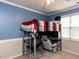 Bedroom with a lofted bed and desk area, perfect for studying at 1100 Open Field Dr, Garner, NC 27529