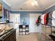 Bedroom features blue walls, unique bunk bed and playful decor at 1100 Open Field Dr, Garner, NC 27529