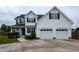 Charming two-story home with a two-car garage and well-maintained landscaping at 1100 Open Field Dr, Garner, NC 27529