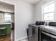 Convenient laundry room area with modern washer and dryer at 1100 Open Field Dr, Garner, NC 27529