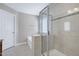 Bathroom featuring glass enclosed shower and separate soaking tub at 112 Briarfield Dr, Apex, NC 27502