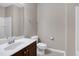 Standard bathroom featuring a white toilet and sink with neutral color scheme, creating a clean and functional space at 112 Briarfield Dr, Apex, NC 27502