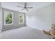Inviting bedroom featuring neutral tones, carpet, and lots of natural light at 112 Briarfield Dr, Apex, NC 27502
