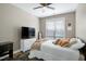 Cozy bedroom featuring a soft rug, natural lighting, and comfortable decor creating a peaceful retreat at 112 Briarfield Dr, Apex, NC 27502