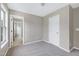 Bedroom with carpet, neutral walls, and a closet at 112 Briarfield Dr, Apex, NC 27502