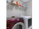Laundry room with Samsung washer and dryer and wire shelving at 112 Briarfield Dr, Apex, NC 27502