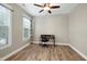 Neutral tone office space filled with light and featuring wood floors at 112 Briarfield Dr, Apex, NC 27502