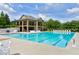 Resort-style community pool with ample lounge chairs and a spacious deck at 112 Briarfield Dr, Apex, NC 27502