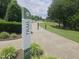 An inviting entrance to the community walking trail at Seagrove Farms Park at 112 Briarfield Dr, Apex, NC 27502