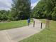 A well-maintained walking trail winding through lush greenery at 112 Briarfield Dr, Apex, NC 27502