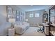 Bright study with a comfortable sofa, contemporary decor and natural light at 1124 Sun Springs Rd, Wake Forest, NC 27587