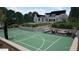 Recreation and lounge area with a full-size basketball court and an outdoor seating area perfect for entertaining at 1132 Wimbleton Dr, Raleigh, NC 27609