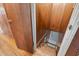Wooden staircase leading to a basement area with wood paneled walls at 1219 Lakeland St, Durham, NC 27701