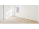 Bright bedroom featuring carpet, ample light, and neutral paint at 1246 Nc-27, Benson, NC 27504