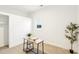 Bright bedroom featuring a minimalist desk with a plant, enhanced by natural light from a window at 1246 Nc-27, Benson, NC 27504