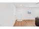 Bright living room with hardwood floors, white walls, and a minimalist aesthetic at 1246 Nc-27, Benson, NC 27504
