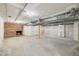 Spacious unfinished basement with exposed brick fireplace, offering potential for customization and expansion at 132 Edgewood Dr, Louisburg, NC 27549
