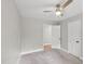 Neutral bedroom with carpet, ceiling fan, a closet, and a doorway to another room at 132 Edgewood Dr, Louisburg, NC 27549