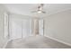 Neutral bedroom featuring carpet, a ceiling fan, and closet at 132 Edgewood Dr, Louisburg, NC 27549
