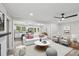 Open-concept space connecting living area and kitchen, creating a spacious feel with modern decor at 132 Edgewood Dr, Louisburg, NC 27549