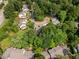Bird's-eye view of a serene community with manicured lawns and tree-lined streets at 1600 Budwood Dr, Raleigh, NC 27609