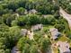 Aerial view of a beautiful neighborhood surrounded by mature trees at 1600 Budwood Dr, Raleigh, NC 27609