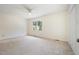 Spacious bedroom filled with natural light from a large window at 1600 Budwood Dr, Raleigh, NC 27609