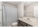 A well lit bathroom with a shower/tub and modern sink at 1725 Winter Jasmine Ln, Wake Forest, NC 27587