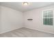 This bedroom offers neutral walls, a window, and soft carpet at 1725 Winter Jasmine Ln, Wake Forest, NC 27587