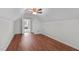 Spacious bonus room has vinyl floors, a ceiling fan, and natural light at 188 Worthington Ct, Clayton, NC 27527