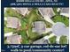 Aerial view of home showing cul-de-sac lot, 3-car garage, and proximity to community center and pool at 2100 Della Ct, Apex, NC 27502