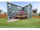 Enjoy a spacious backyard with a deck, perfect for outdoor gatherings and relaxation at 2100 Della Ct, Apex, NC 27502