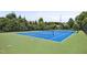 Well-maintained tennis court for residents to enjoy friendly matches and improve their game at 2100 Della Ct, Apex, NC 27502