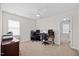 Versatile bedroom space with neutral carpet, a ceiling fan, and great natural light for office or relaxation at 224 Swann Trl, Clayton, NC 27527