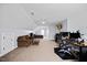 Expansive bonus room with seating, media, and office area, perfect for multi-functional living at 224 Swann Trl, Clayton, NC 27527