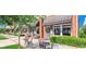Charming commercial building with outdoor seating, perfect for enjoying a meal or coffee outside at 224 Swann Trl, Clayton, NC 27527