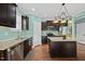 Well-appointed kitchen featuring granite counters, stainless appliances, and a functional center island at 224 Swann Trl, Clayton, NC 27527