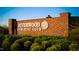 Elegant brick signage for Riverwood Athletic Club with manicured landscaping at 224 Swann Trl, Clayton, NC 27527