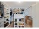 Custom walk-in closet with ample shelving, hanging racks, and storage solutions at 224 Swann Trl, Clayton, NC 27527