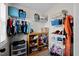 Spacious walk-in closet with ample storage, shelving, and rods for organized clothing and accessories at 224 Swann Trl, Clayton, NC 27527