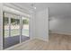 Empty dining area featuring sliding door leading to outdoor space and natural light at 2329 Field Poppy Dr, Apex, NC 27502