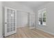 Bright office with double doors and a window offering ample light for a productive workspace at 2329 Field Poppy Dr, Apex, NC 27502