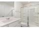 Clean bathroom featuring a glass-enclosed shower and vanity with sink at 261 Johnson Ridge Way, Four Oaks, NC 27524