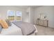 Bright bedroom featuring plush carpet, scenic views, and elegant decor with neutral color palette at 284 Johnson Ridge Way, Four Oaks, NC 27524